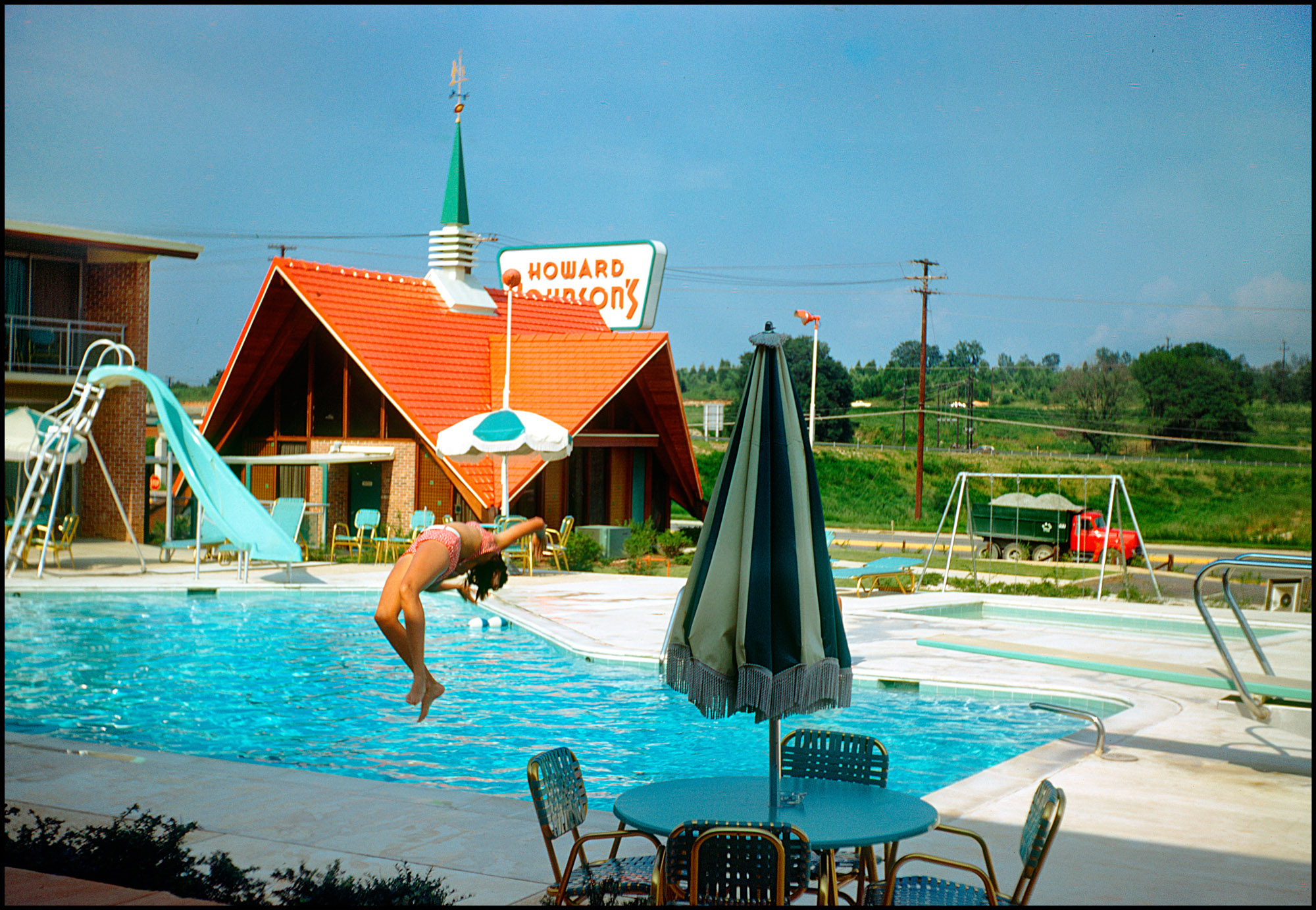 Poolside at a Howard Johnson's Motor Lodge in Austin, Texas, 1967. 35mm Kodachrome transparency by Hugh Mason Ayer. View full size.