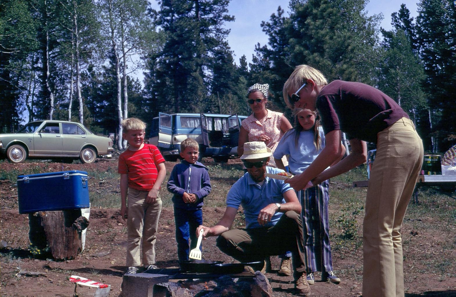 There I am with my scraggly hair and my cool dark glasses. My little brother is far left, and the other peeps are family friends from those days. In the distance is our '71 Toyota and the mid '60s Dodge van belonging to the our friends. 

I'm amazed I was even in the picture. I must have been in a good mood that day.