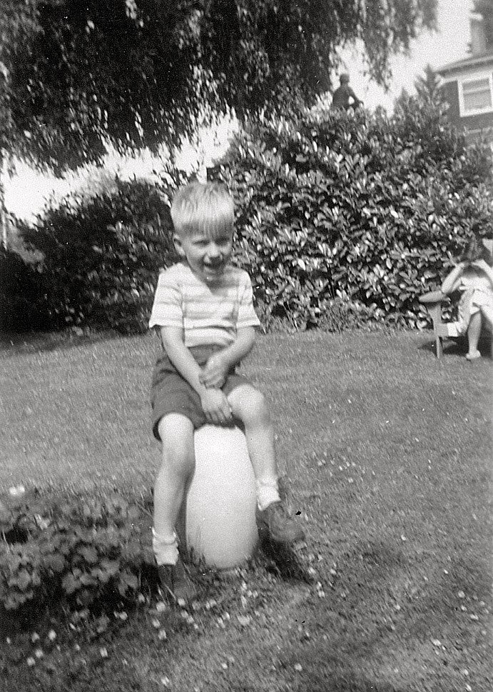 One of my "Instant Relative" photos.  Always thought it's a tall pumpkin or gourd he's sitting on, but now am not so sure ... maybe a big rock?  Whatever it is, he sure seems to be having fun!