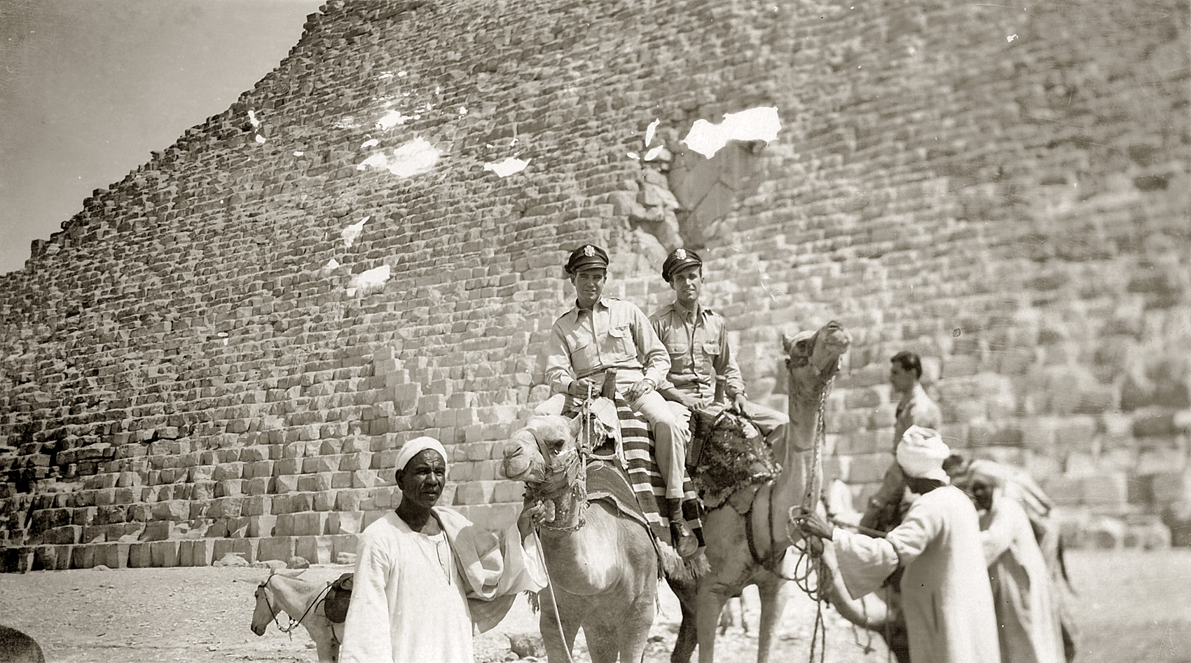 Here's my grandfather again at the Pyramids in Egypt sometime between late '44 and late '45 . There's no note on this print but he's clearly just being a tourist. View full size.