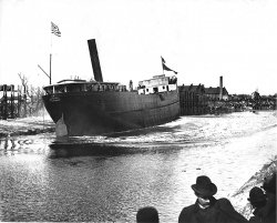 The 251 foot Great Lakes steamer Ravenscraig was launched at the Black River yard of the Jenks Ship Building Company in Port Huron, Michigan, sometime in 1900.  From this same yard Jenks launched their only passenger ship, the Eastland, in May 1903.  In 1915 the Eastland would become infamous when she capsized in the Chicago river with the loss of 844 lives. The Ravenscraig sailed the Great Lakes until 1907 when she was sold for off-lakes use. View full size.
(ShorpyBlog, Member Gallery)