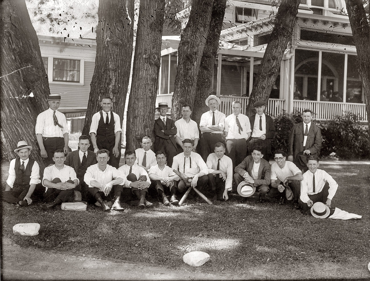 After a baseball game the Raybestos Company employee team is shown relaxing at the Brooklawn Country Club in Fairfield, Connecticut. My father, James Edward McKenna, fourth from the left in the back row, is leaning against a tree. Picture was taken about 1917. From the several smiles on their faces, I imagine that they won the game that day. - Robert Edward McKenna View full size.