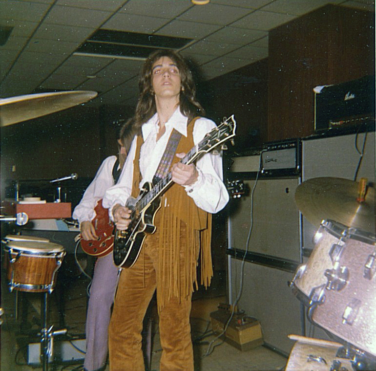 Me in the 70's playing at my prom. Where is that vest? View full size.