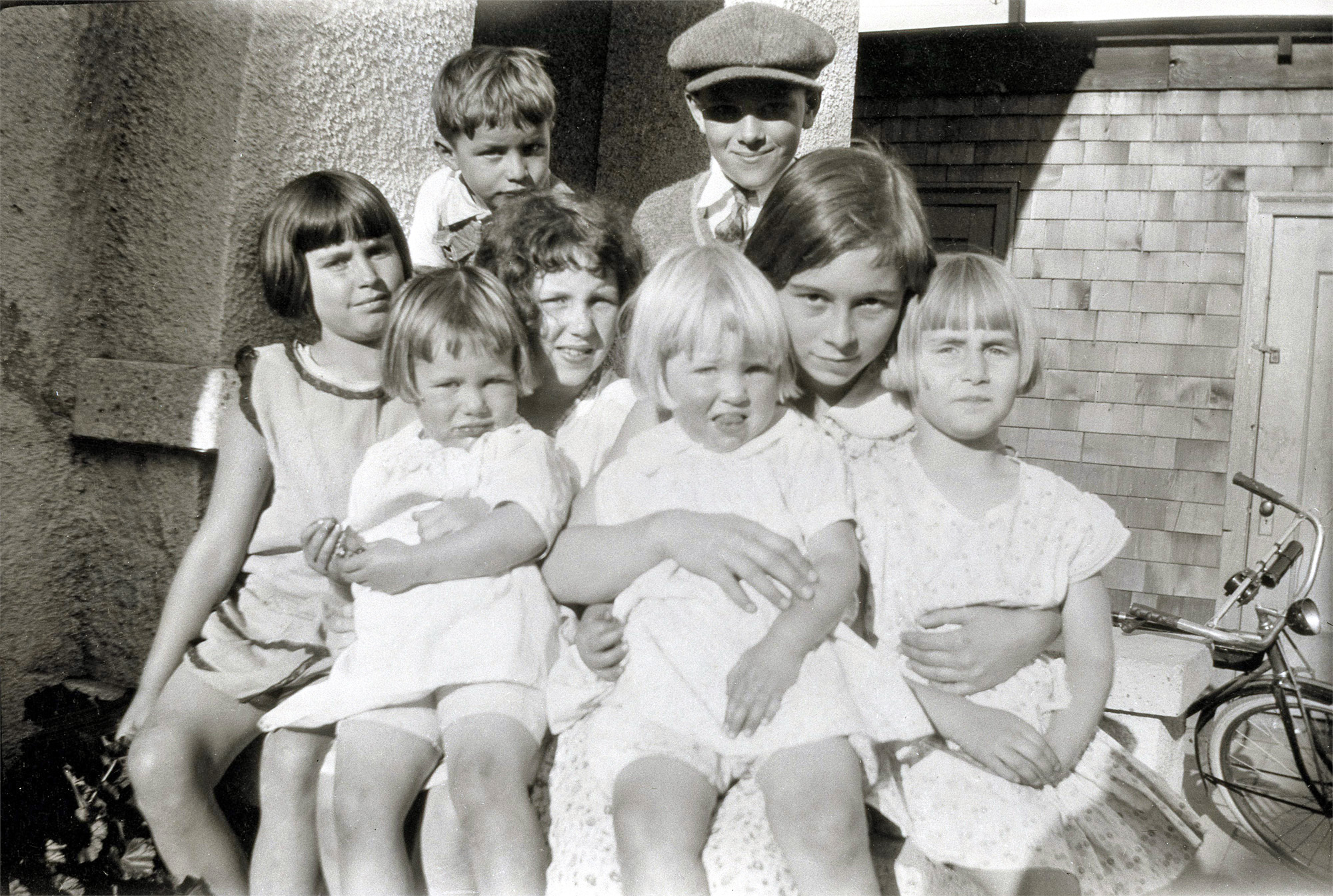 If these are all her siblings it might explain why Mom looks so unhappy. View full size.