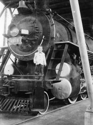 This snapshot of my brother, Rocky, on locomotive (SLSF 4018 or Frisco 4018) at the Alabama State Fairgrounds around 1960. The old locomotive was a fixture there until 2009 when the fairgrounds was redeveloped.
(ShorpyBlog, Member Gallery)