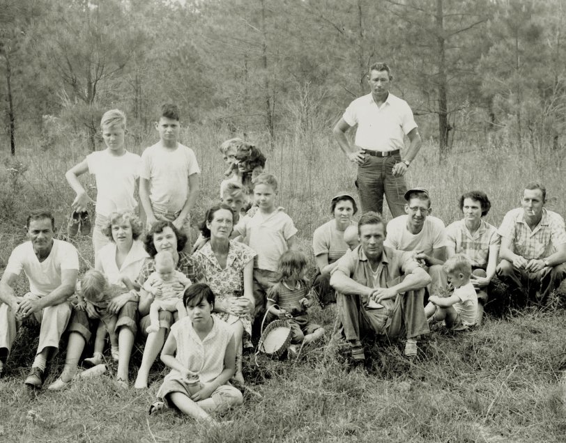 My wife's grandparents had nine children and most are pictured here along with various grandchildren and extended family. This would have been an Easter outing in the piney woods, north of Columbus, Georgia in 1957. View full size.
