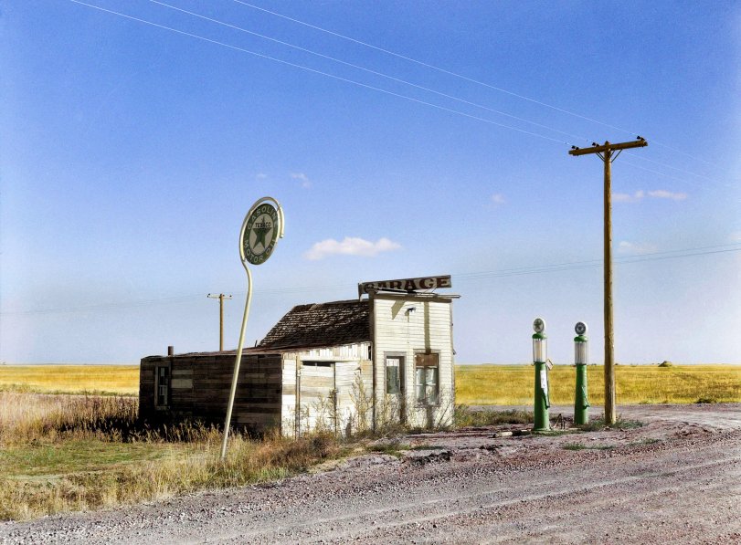 October 1937. "Abandoned garage on Highway No. 2. Western North Dakota." Medium format safety negative by Russell Lee for the FSA. I liked this picture and decided to colorize it. View full size.

