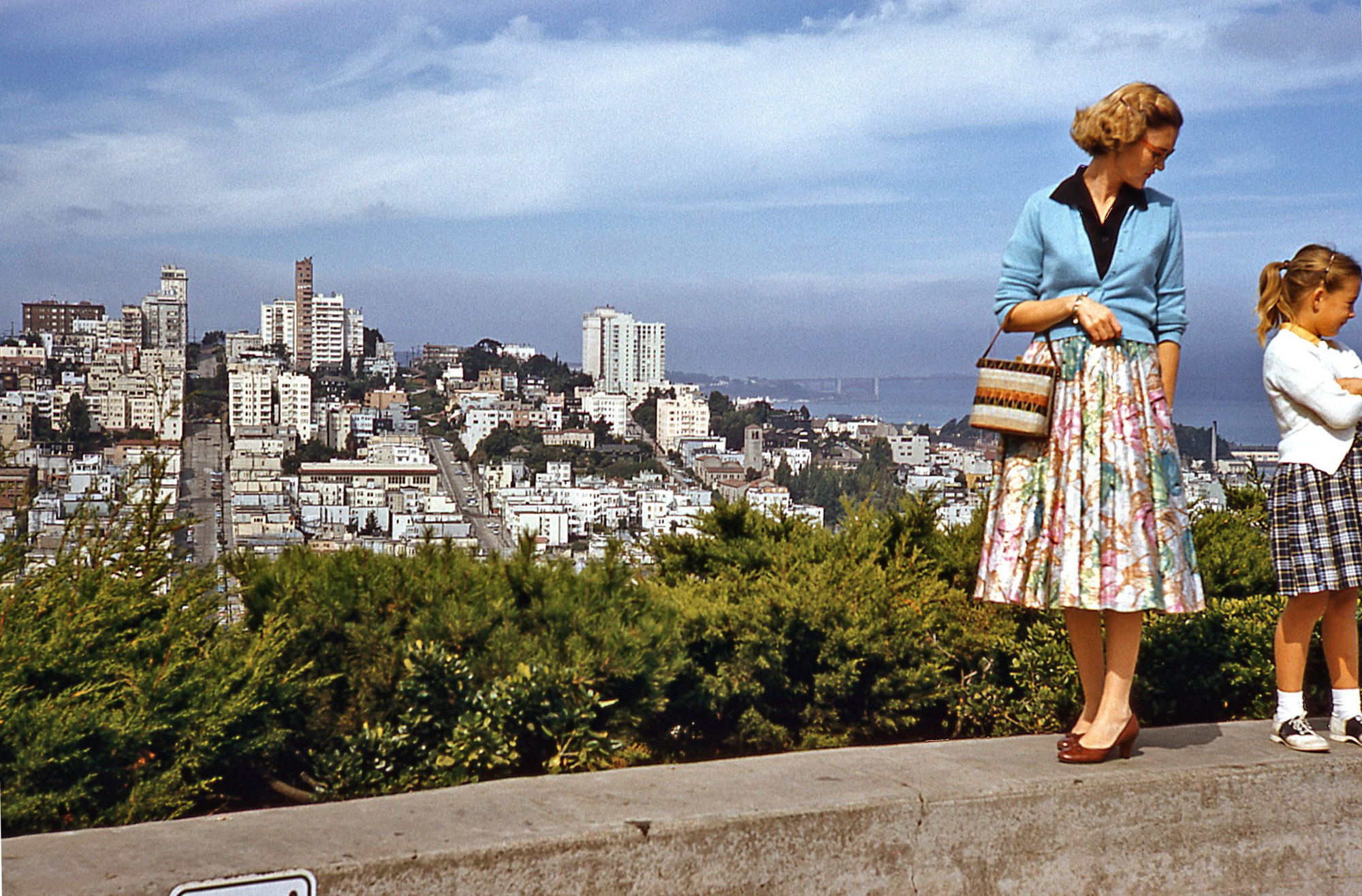 Another shot of The City, from August, 1957. I think my sister is rebelling at yet another pose request from my dad. I was familiar with the feeling. View full size.