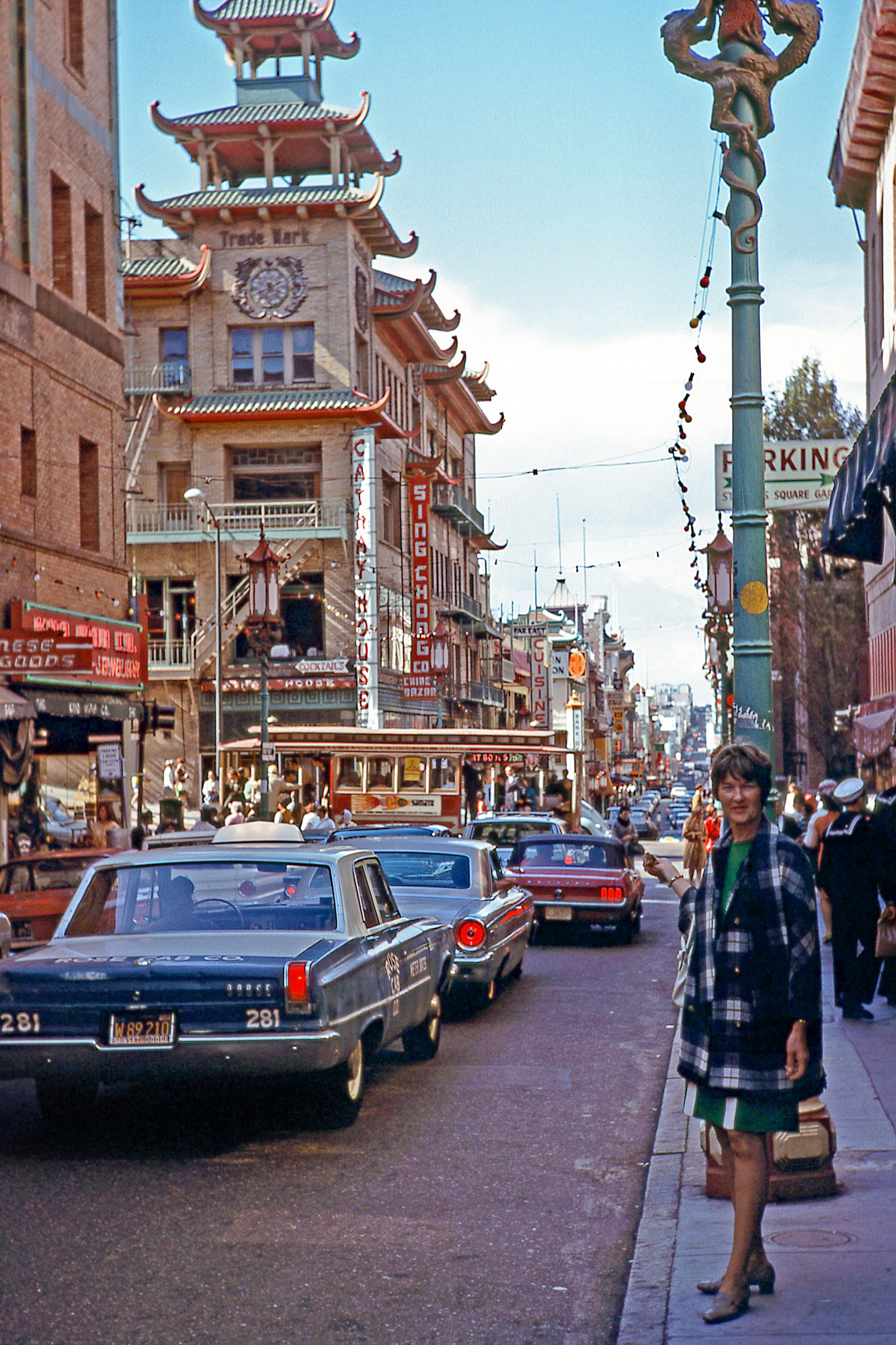 August 1968. My mom in San Francisco's Chinatown at Grant and California Streets; Kodachrome slide by my dad. View full size.