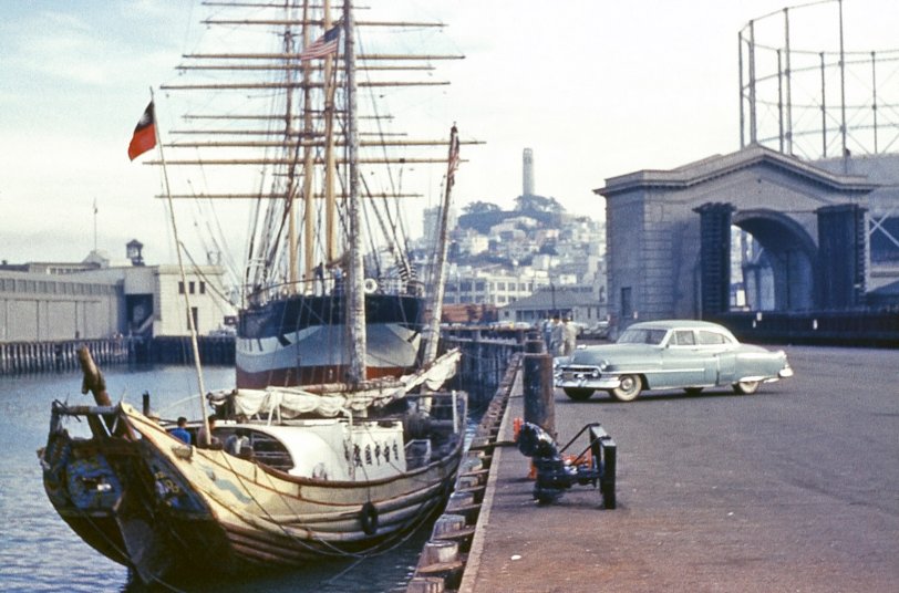 Another in the San Francisco series taken by my father, this time of the waterfront, not far from Fisherman's Wharf. A few things of interest here:
 - The Chinese junk in the foreground
 - Coit Tower in the background
 - The steel frame for a gas pressure equalization tank on the right
 - The sailing ship "Balclutha", just behind the junk.
 View full size.
