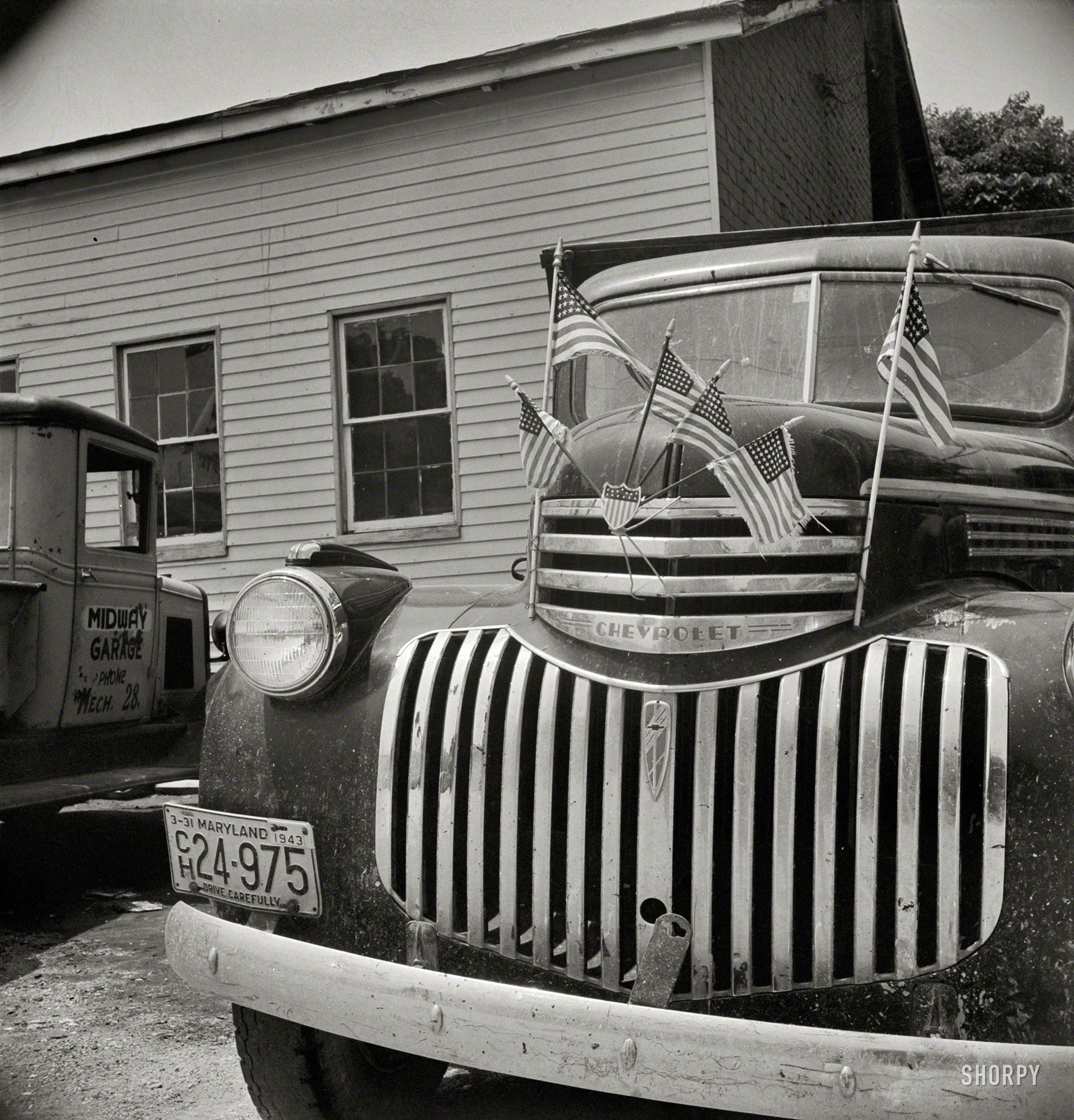 July 1942. "Service station in Mechanicsville, Md." Our second visit to the Midway Garage. Photo by Marjory Collins, Office of War Information. View full size.