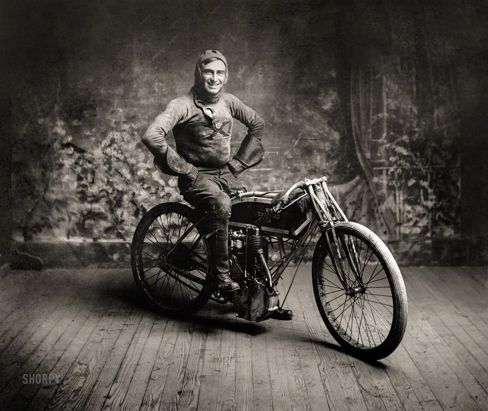 "Ray Weishaar, winner of 100-mile race at Norton, Kansas. October 22, 1914. Time 2 hr. 1½ min. World record." Lawrence Ray Weishaar (1890-1924), the "Kansas Cyclone" and rider for the Harley-Davison "Wrecking Crew," died at the age of 33 after crashing his bike during a race in Los Angeles. View full size.