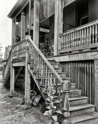 Mobile, Alabama, 1939. " 'Texas,' ca. 1846 addition to Waring House built by Edmund Dargan, 110 Church Street." (Also seen here.) Note the contraption on the porch. 8x10 acetate negative by Frances Benjamin Johnston. View full size.