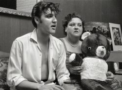 May 1956. Memphis, Tennessee. "Elvis Presley at home with his mother, Gladys." 35mm negative from photos by Philip Harrington for the Look magazine assignment "Elvis Presley -- He Can't Be, but He Is." View full size.