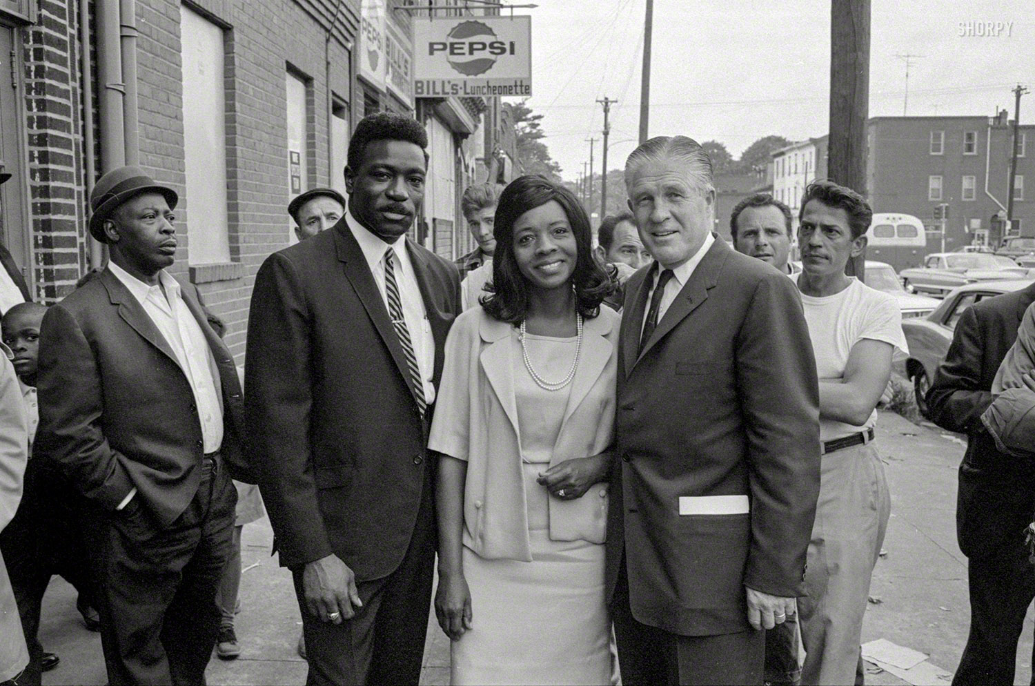 October 1967. "Michigan Gov. George Romney in urban area." The Republican presidential aspirant during the "ghetto tour" that took him to more than a dozen inner cities following that year's race riots and civil unrest. From photos by James Karales for Look magazine. View full size.