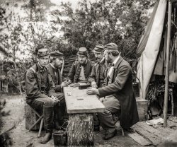 May 1862. "Yorktown, Va. (vicinity). The Peninsular Campaign -- Camp Winfield Scott. Duc de Chartres, Comte de Paris, Prince de Joinville and friends playing dominoes at mess table." Wet plate negative by James F. Gibson. View full size.