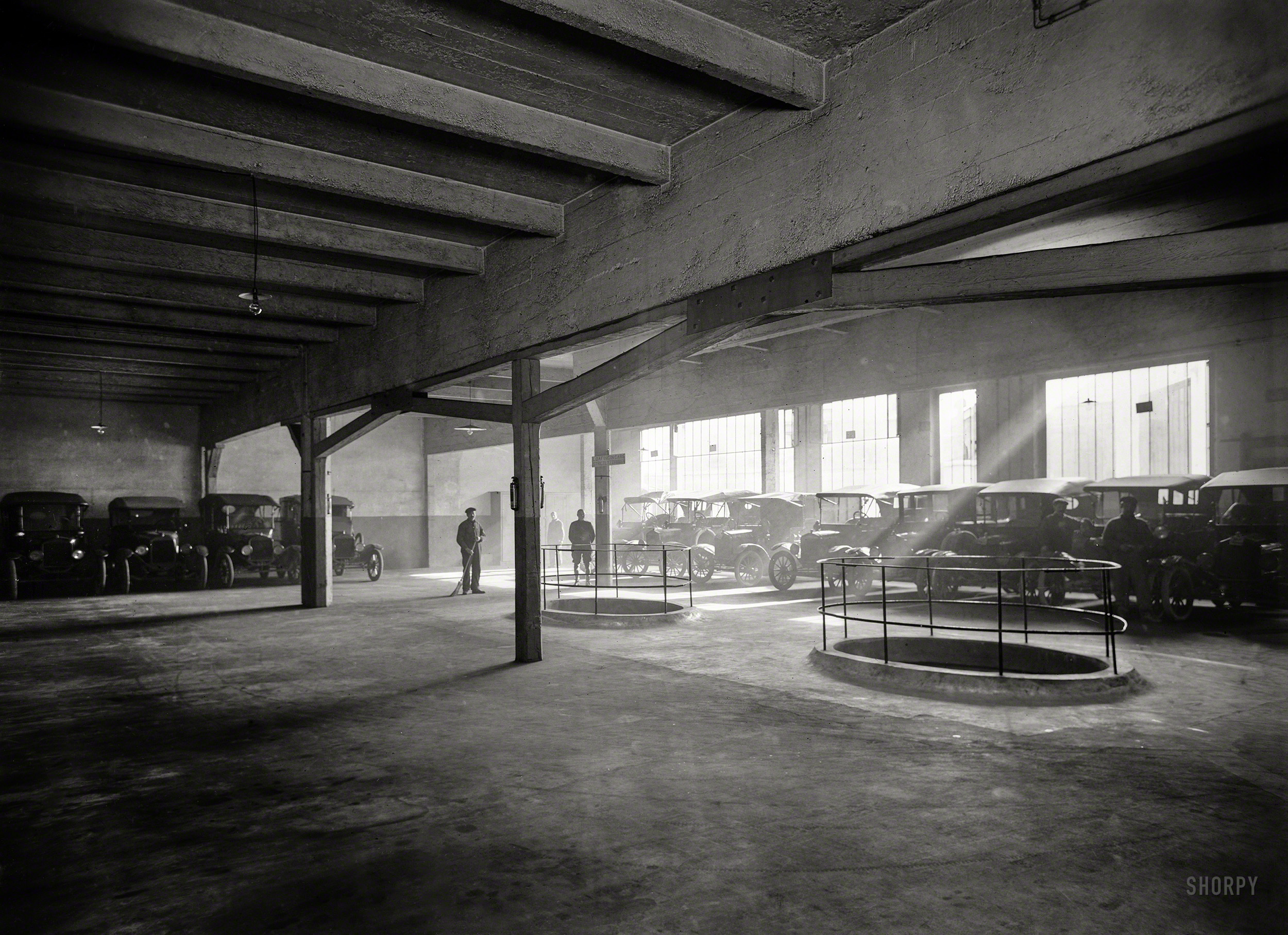 March 17, 1919. "Paris. Interior of the American Red Cross garage at 79 Rue Laugier." Note the sign advising that LOAFING IN CARS STRICTLY FORBIDDEN. 5x7 inch glass negative, American National Red Cross. View full size.