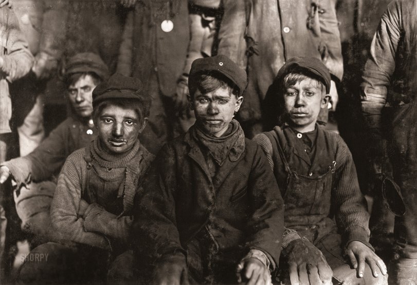 January 1911. "Group of boys working in No. 9 Breaker. Pennsylvania Coal Co., Hughestown Borough, Pittston, Pennsylvania. Smallest is Sam Belloma, Pine Street." Photograph by Lewis Wickes Hine for the National Child Labor Committee. View full size.
