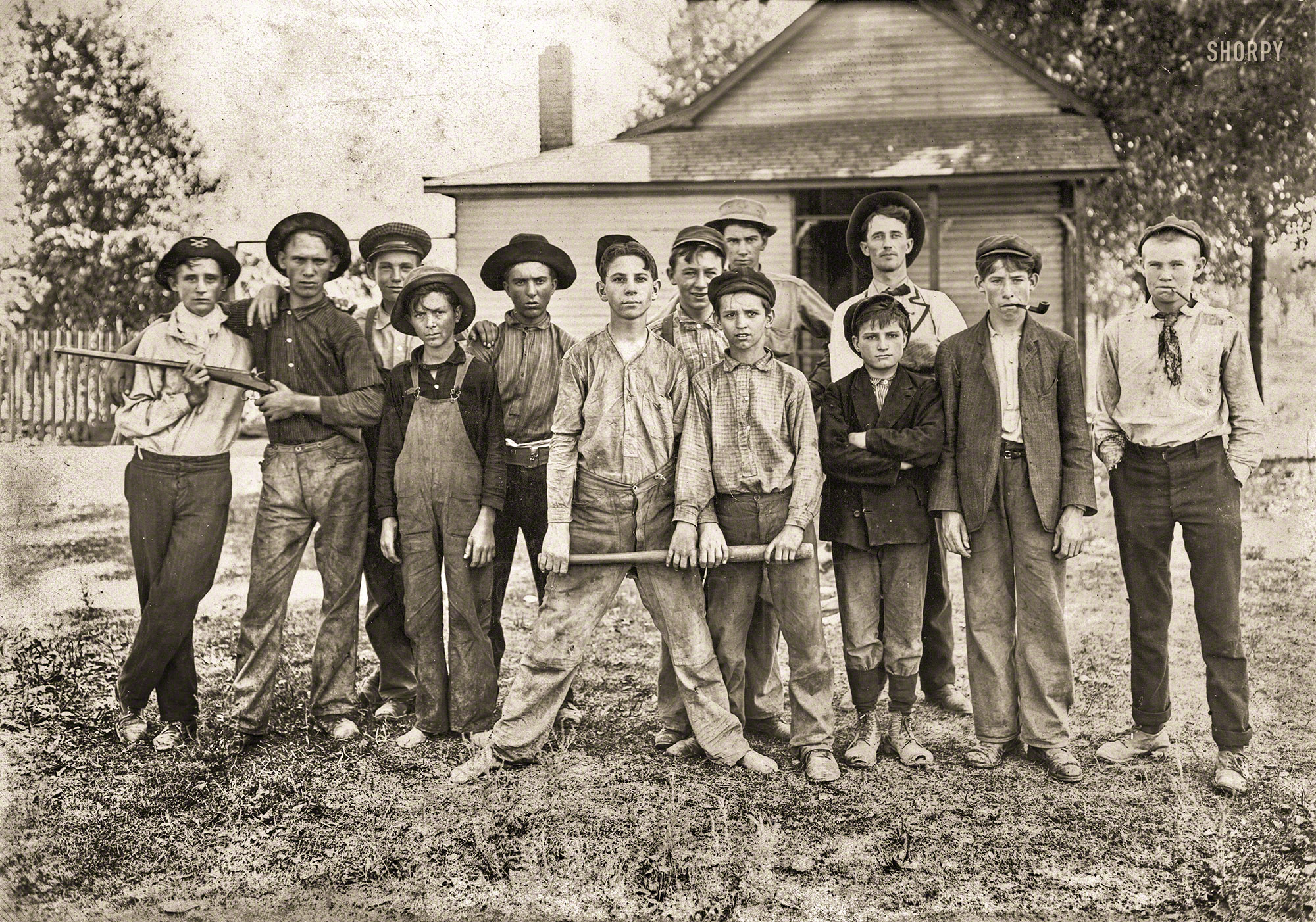 August 1908. "The Ball Team. Composed mainly of glass workers. Indiana." Gelatin silver print by Lewis Wickes Hine. View full size.