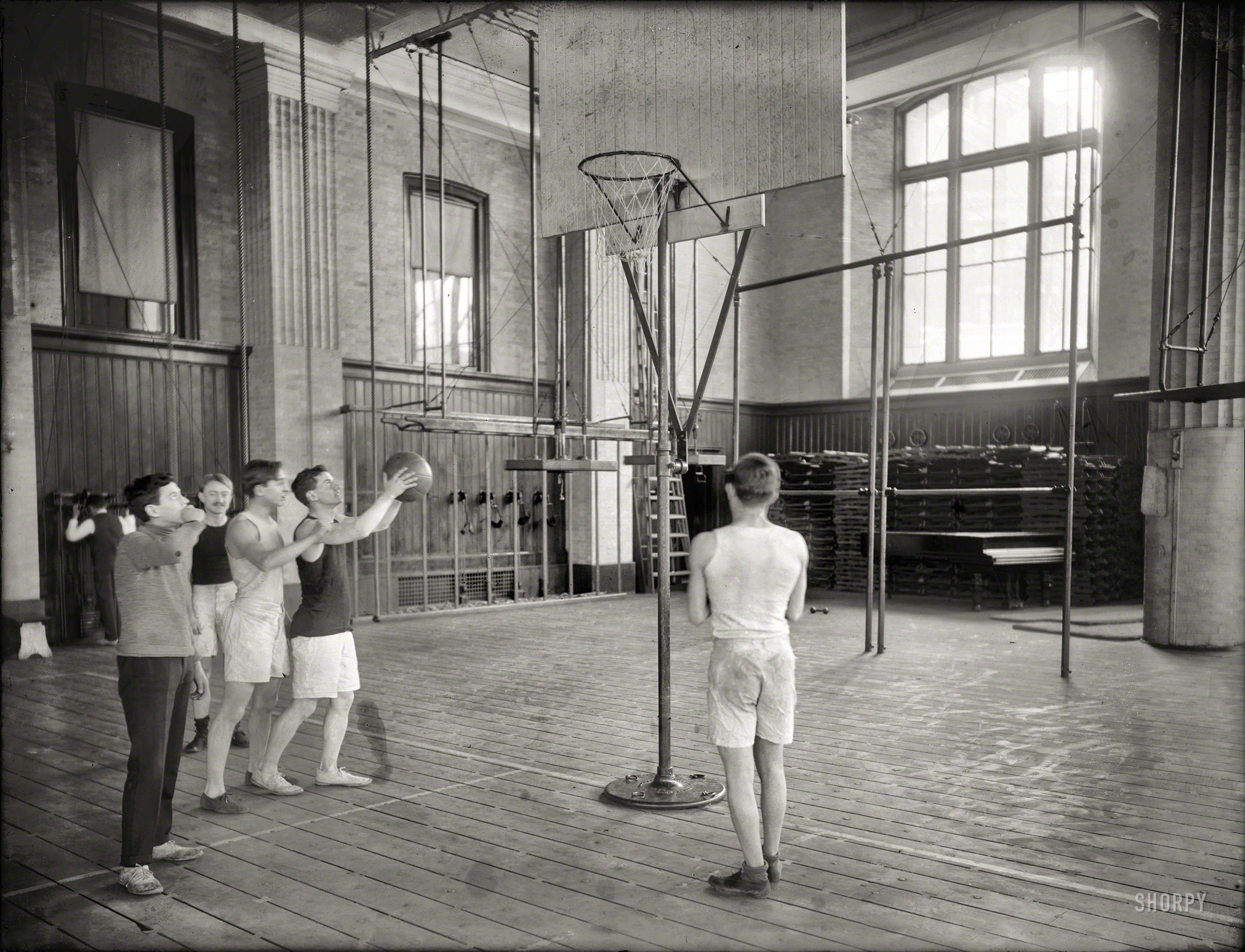 &nbsp; &nbsp; &nbsp; &nbsp; No doubt some of your chums are already enjoying this fast-paced sport. Why not give it a "shot" to-day?
New York, 1908. "Basket-ball at Columbia University gymnasium." 8x10 inch glass negative, George Grantham Bain Collection. View full size.