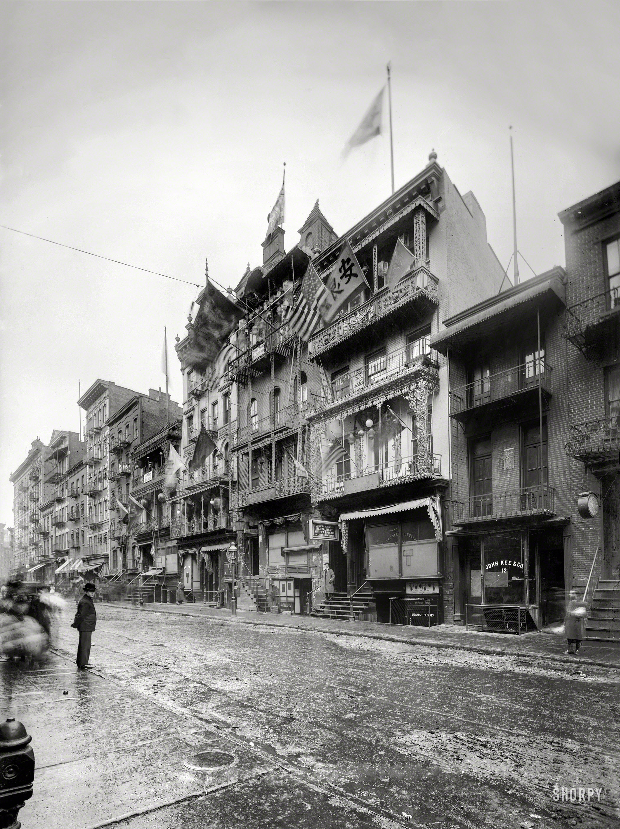 January 30, 1911. New York. "New Year's decorations in Chinatown on Mott Street." 8x10 inch glass negative, Bain News Service. View full size.