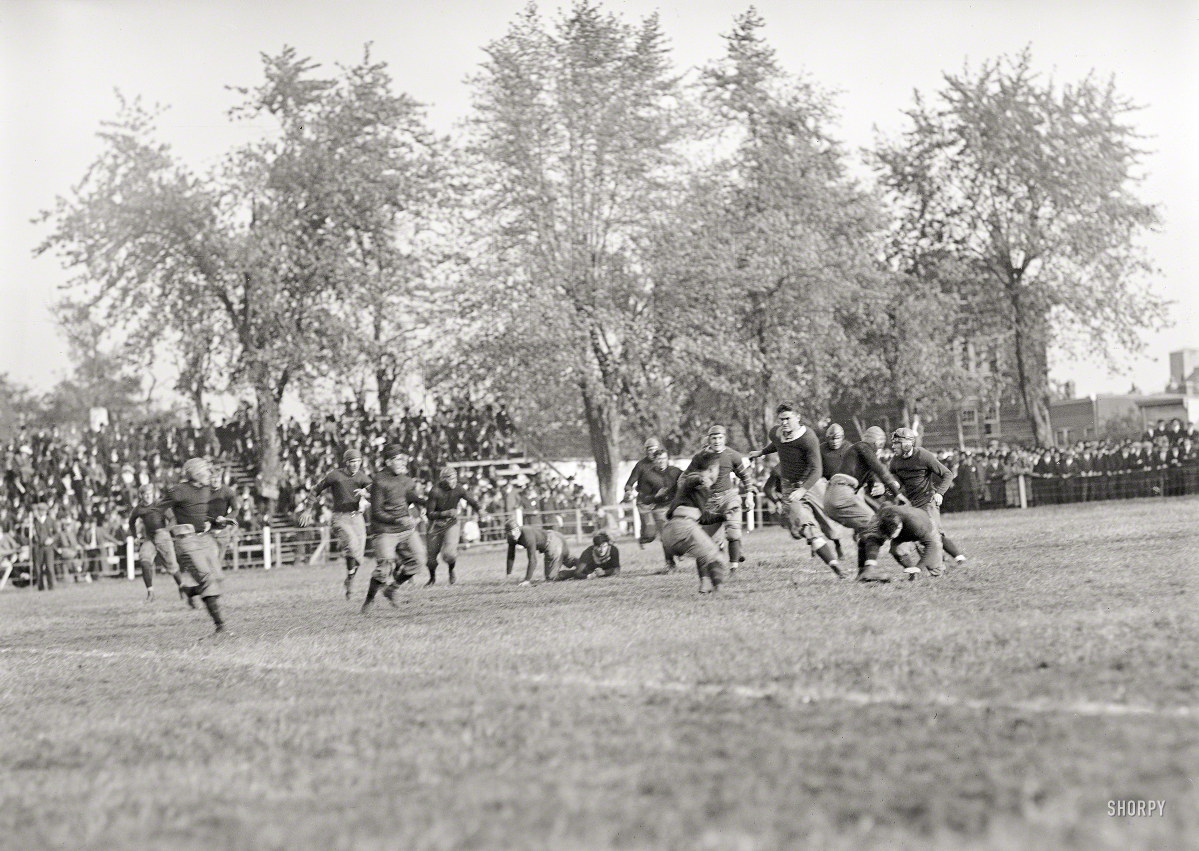 1912. Washington, D.C. "Georgetown-Carlisle game; Glenn Warner." But ... where are the skyboxes? Harris & Ewing Collection glass negative. View full size.