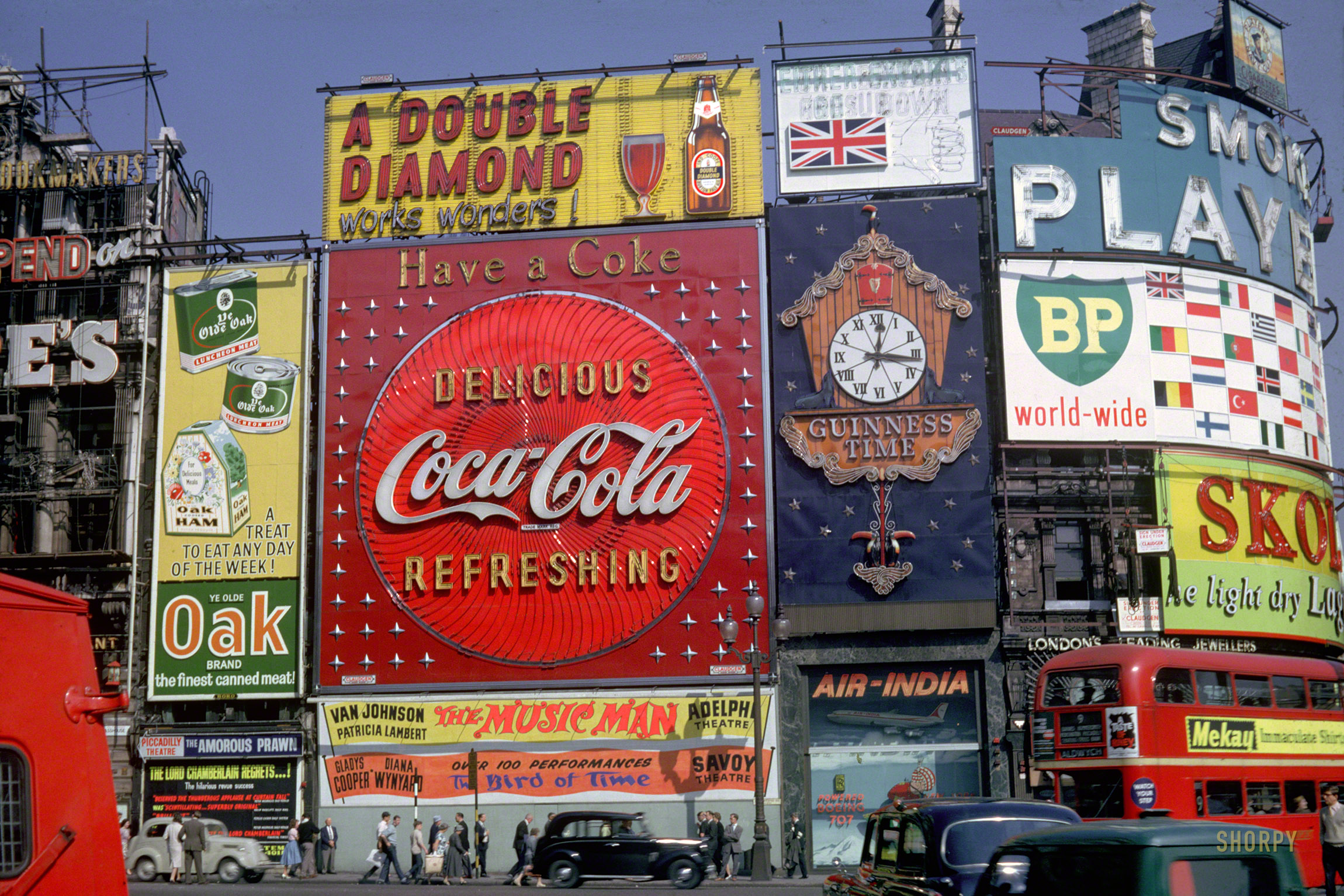 A Kodachrome slide sent to us from Canada a few years back with the caption "Piccadilly Circus, London, 1961." We loved "The Music Man" but somehow missed seeing "The Amorous Prawn." View full size.