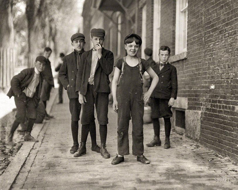 May 1909. Manchester, New Hampshire. "Boy with bare arms, Fred Normandin, 15 Bridge Street, has been working in Amoskeag Manufacturing Company mill No. 1 for several months." Photo by Lewis Wickes Hine. View full size.
