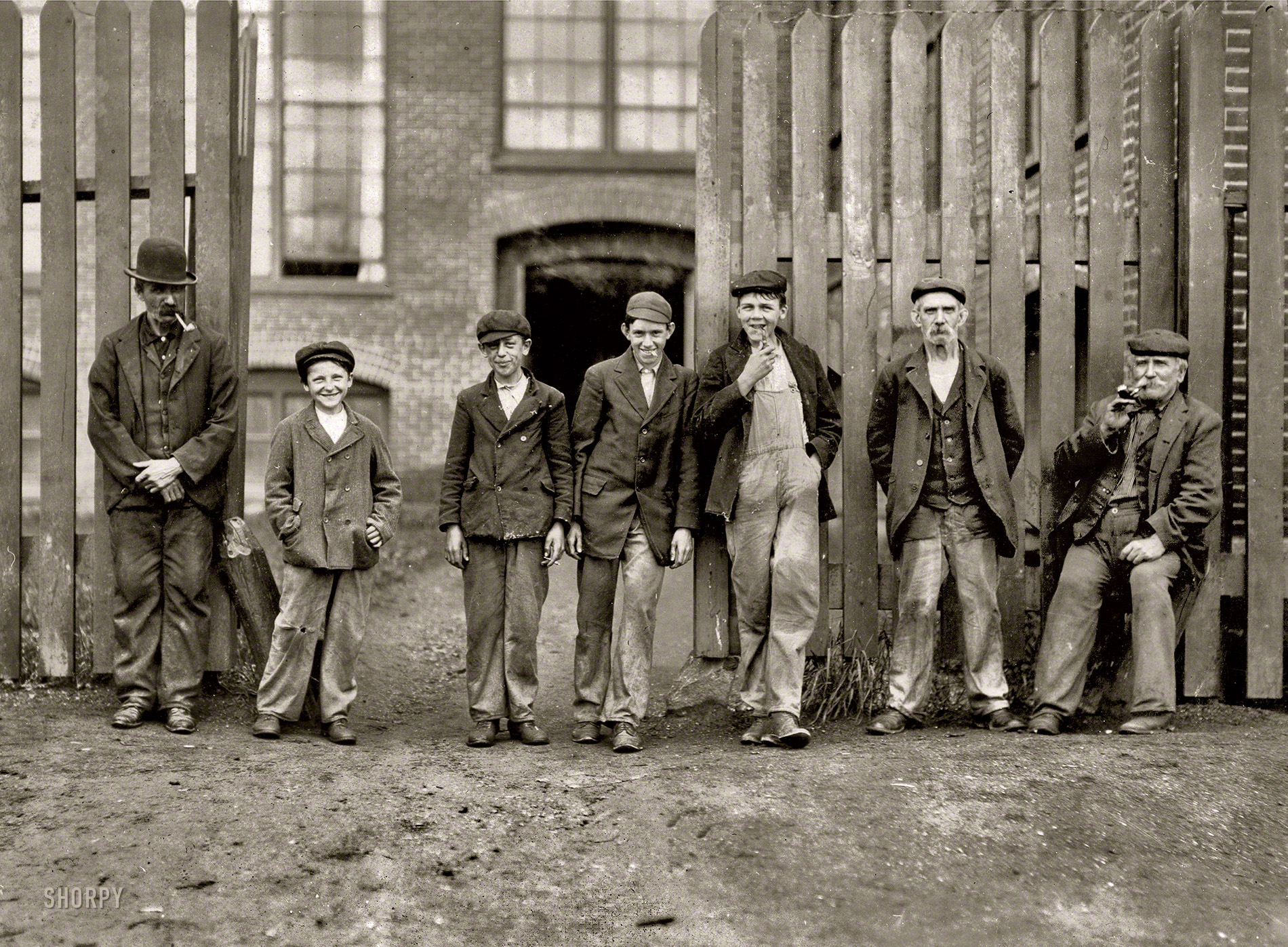 "Noon, June 10, 1909. Parker Mill in Warren, Rhode Island. I saw these and nearly a dozen youngsters who looked to be under 14 at work there that A.M. when I went through the mill as a visitor." Photo by Lewis Wickes Hine. View full size.