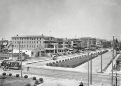 July 1911. "Street scene, 2nd Avenue, Asbury Park." Greetings from this pleasant setting for the ice wagon, streetcar, sandwich shop and resort hotels. 5x7 glass negative, George Grantham Bain Collection. View full size.