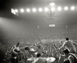 April 1956. "Performance by Bill Haley and the Comets and LaVern Baker at the Sports Arena in Hershey, Pennsylvania." From photos by Ed Feingersh for the Look magazine article "The Great Rock 'n' Roll Controversy." View full size.