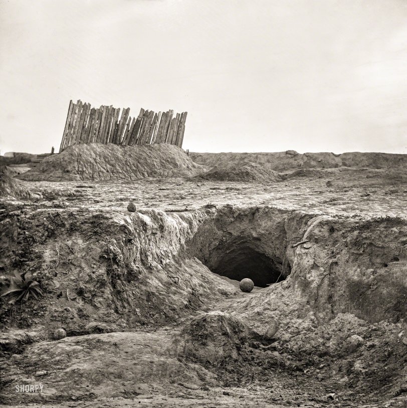 1865. "Earthwork fortifications and bomb-proofs in front of Petersburg, Va." Wet plate glass negative, Civil War collection, Library of Congress. View full size.
