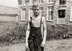 June 20, 1916. Fall River, Massachusetts. "Marian Viera, 101 Columbia St., Doffer in mill. Says he gets $7.74 a week." Photo by Lewis Wickes Hine. View full size.