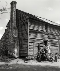 1938. "Andrews Log House, Rutherford County, North Carolina. Norwell, tenant." 8x10 inch acetate negative by Frances Benjamin Johnston. View full size.