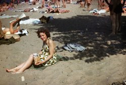 "Montrose Beach, Chicago, 1946." Our Michigan mother, last seen here and here, working on a Great Lakes suntan. 35mm Kodachrome slide. View full size.