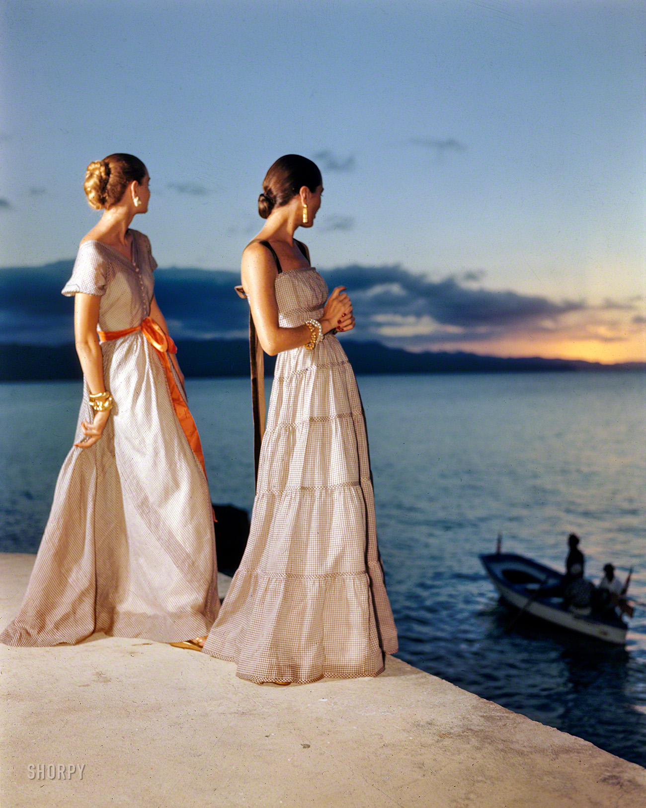 November 1946. "Women in evening gowns on waterfront. San Juan, Puerto Rico." Medium format color transparency by Toni Frissell. View full size.