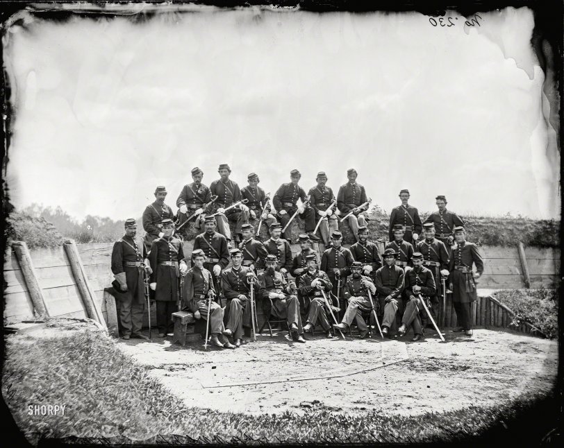 July 1865. "Col. William Telford and officers of the 50th Pennsylvania Infantry at Gettysburg." Wet plate negative by William Morris Smith. View full size.
