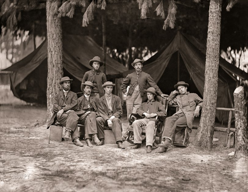 August 1864. Petersburg, Virginia. "Military telegraph operators at headquarters." Photos from the main Eastern theater of war, the siege of Petersburg, June 1864-April 1865.  Wet plate glass negative from Civil War photographs compiled by Milhollen and Mugridge. View full size.
