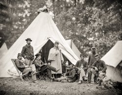 "June 1863 Gettysburg Campaign. Fairfax Court House, Virginia. Capt. J.B. Howard, Office of Assistant Quartermaster, and group at headquarters, Army of the Potomac." Wet plate glass negative by Timothy H. O'Sullivan. View full size.