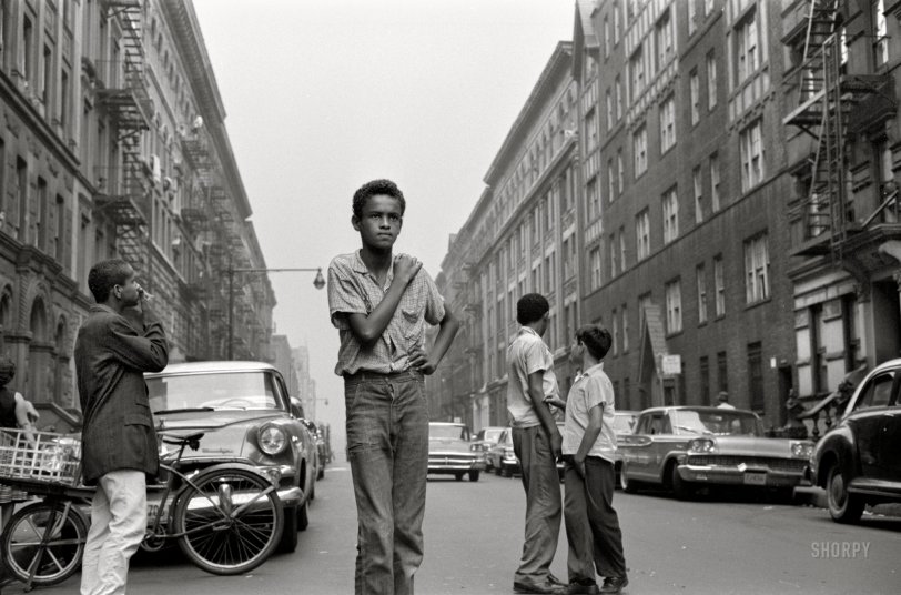 September 15, 1959. "Photos show 14-year-old José Rivera, a Puerto Rican immigrant, his friends, family and neighborhood on New York City's Upper West Side; playing stickball on street; on streets during day and night; playing pool and basketball at a community center; making boxes in a pizza parlor; at church; with family in their apartment." 35mm negative by Paul Fusco for the Look magazine assignment "The Real West Side Story." View full size.

