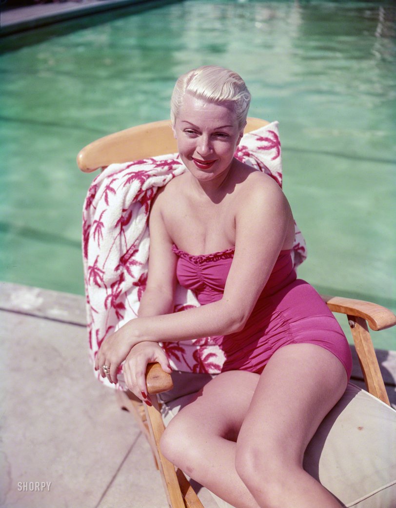 &nbsp; &nbsp; &nbsp; &nbsp; Why sunbeams travel 93 million miles in 8 minutes.
1951. Santa Barbara, California. "Lana Turner lounging by the pool at the Coral Casino." Color transparency by Earl Theisen for Look magazine. View full size.