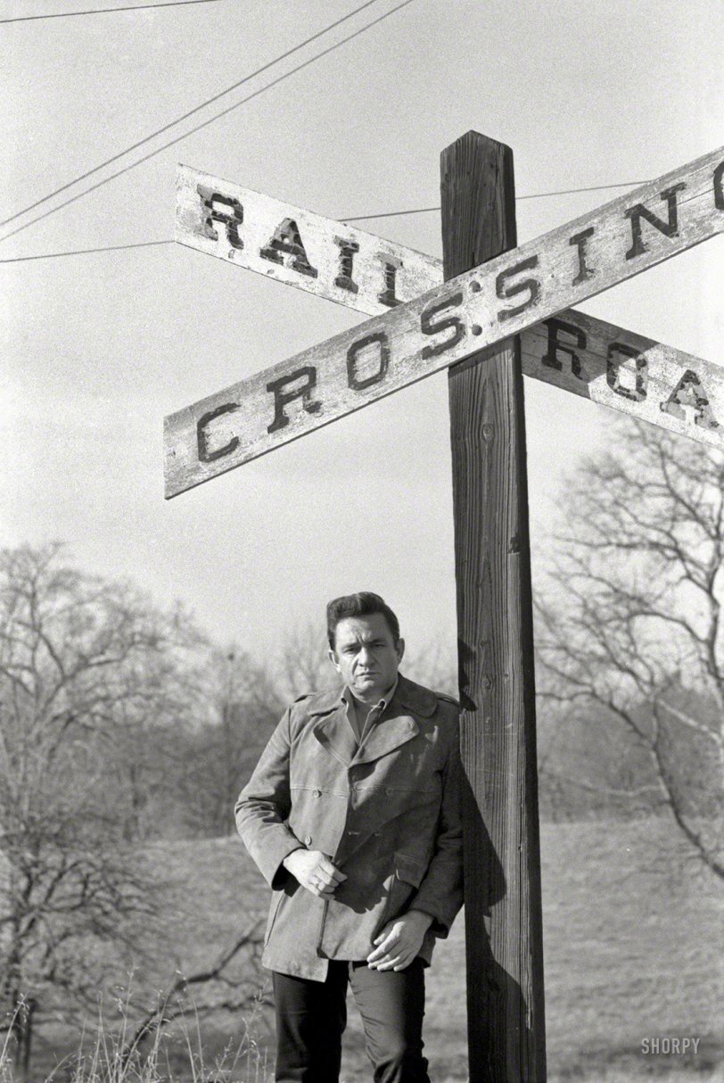 Johnny Cash in 1968, near the Arkansas farm where he grew up. Going to Memphis, no doubt. From photos by Joel Baldwin for the Look magazine assignment "The Restless Ballad of Johnny Cash." View full size.
