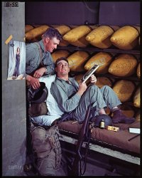 1943. " 'At Ease.' Two soldiers in a bomb storage facility at Camp Pendleton, Calif., admiring portrait of a young woman. Pinup of Susan Hayward hangs nearby." Dye destruction print made in 2002 from Frank S. Errigo's original 4x5 Kodachrome. Exhibited in "American Treasures of the Library of Congress." View full size.