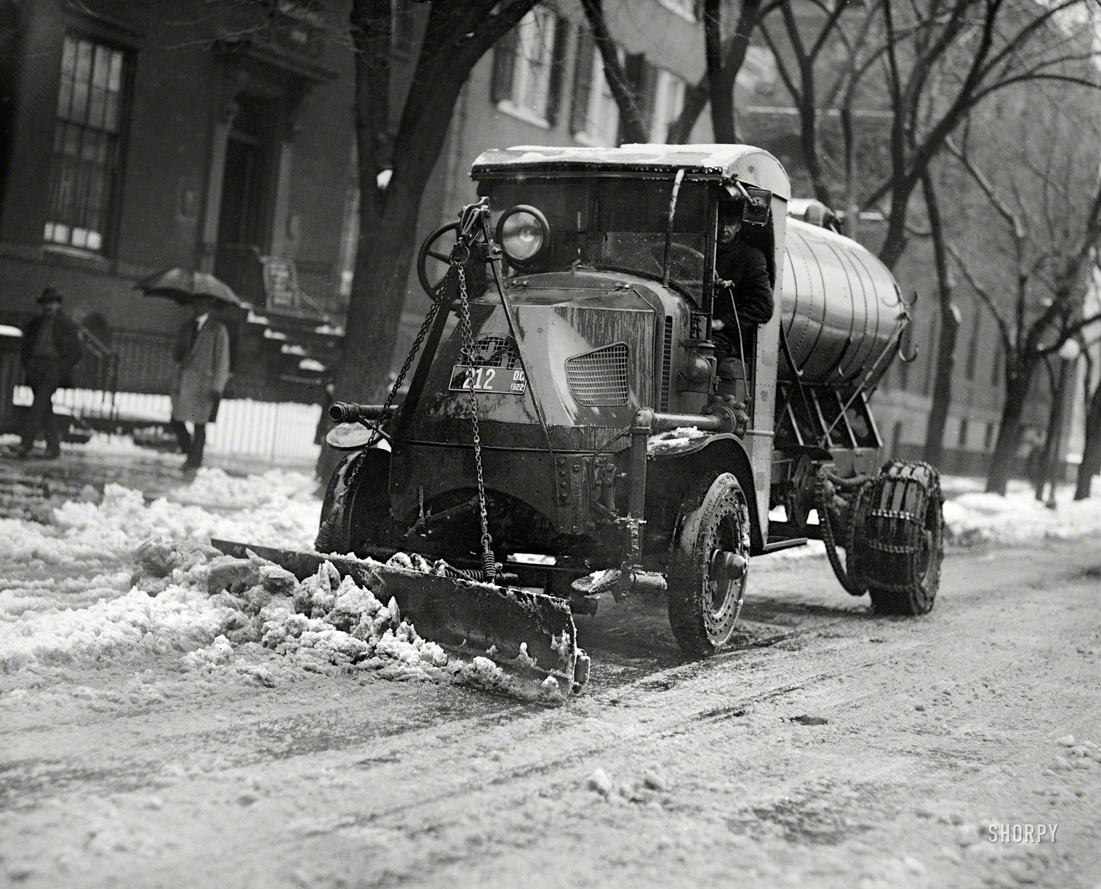 Washington, D.C., 1922. "Tank truck with plow clearing snow." Who'll be first to ID the street? National Photo Company glass negative. View full size.