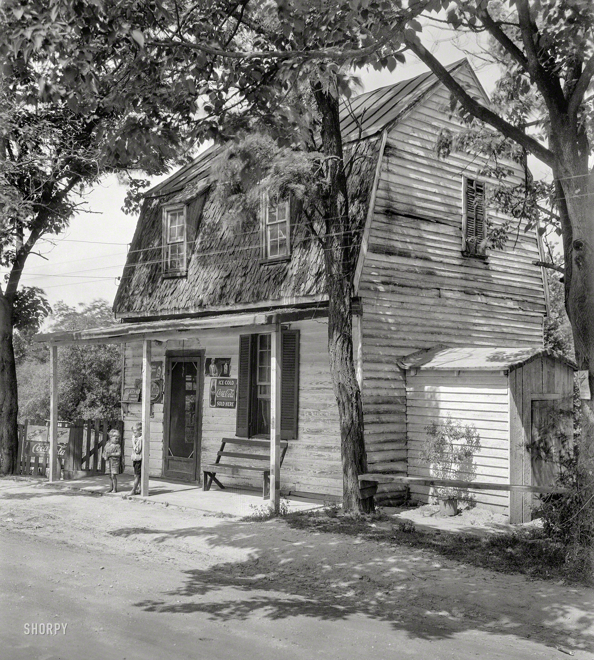 Circa 1928. "Mrs. Ellis's store, Falmouth, Stafford County, Va." Welcome to the Nicotine & Caffeine Canteen. Photo by Frances B. Johnston. View full size.