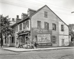 Fredericksburg, Virginia, circa 1928. "John Paul Jones House, Main Street." Home not only of the Revolutionary War naval commander but also of the Sanitary Grocery. 8x10 acetate negative by Frances Benjamin Johnston. View full size.
