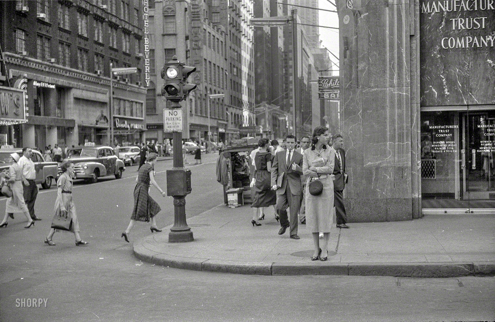 1956. "New York. 21-year-old Mary Cumming, a secretary in offices of designer Raymond Loewy." Who'll be first to locate this intersection? Photo by Phillip Harrington for the Look magazine assignment "Career Girl." View full size.