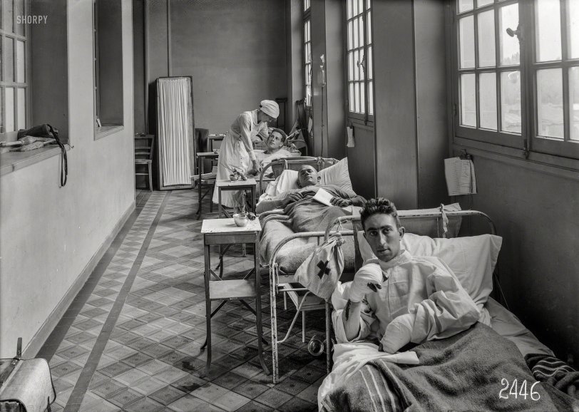 June 14, 1918. "Scene in corridor of American Military Hospital No. 1 at Neuilly, France." Photo by Lewis Hine for the American Red Cross. View full size.
