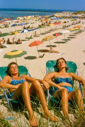 August 1957. "Nantucket sunbathing. Also Fishing, Lounging, Teenagers." 35mm Kodachrome by Toni Frissell for the Sports Illustrated assignment "Nantucket Essay." View full size.