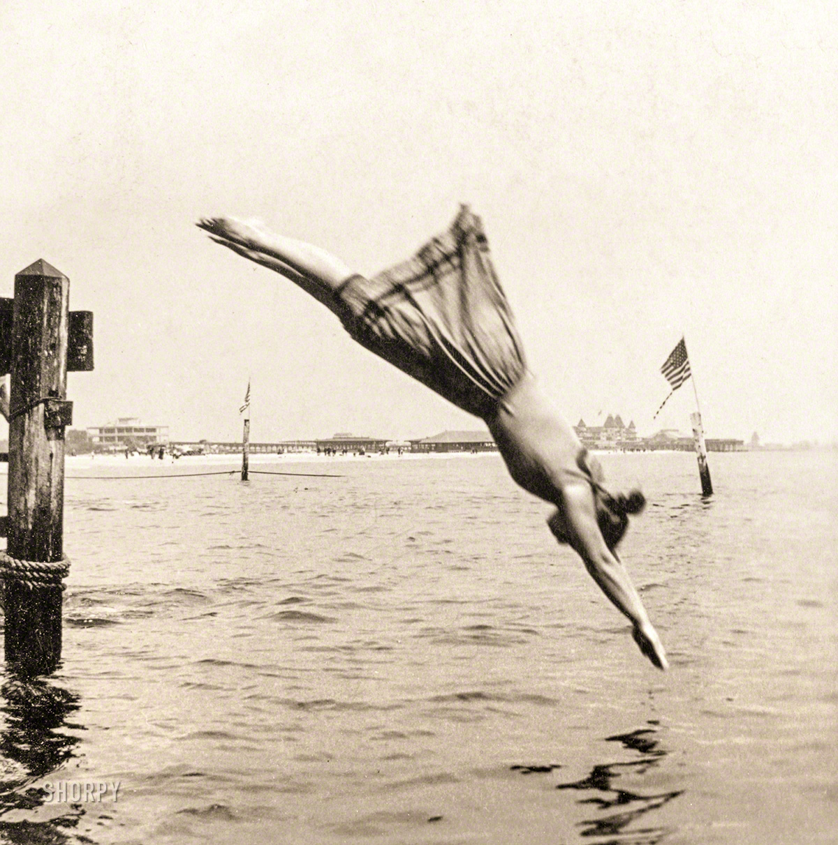 Circa 1892. "Woman diving from pier." Albumen print from "J.S. Johnston's series of American stereoscopic views," 1889-1892. View full size.